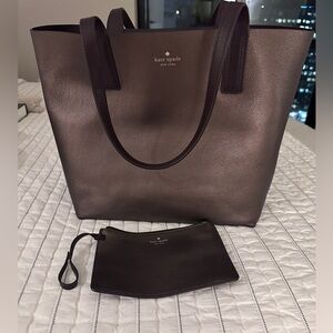 Barely used. Kate Spade reversible tote and matching removable pouch